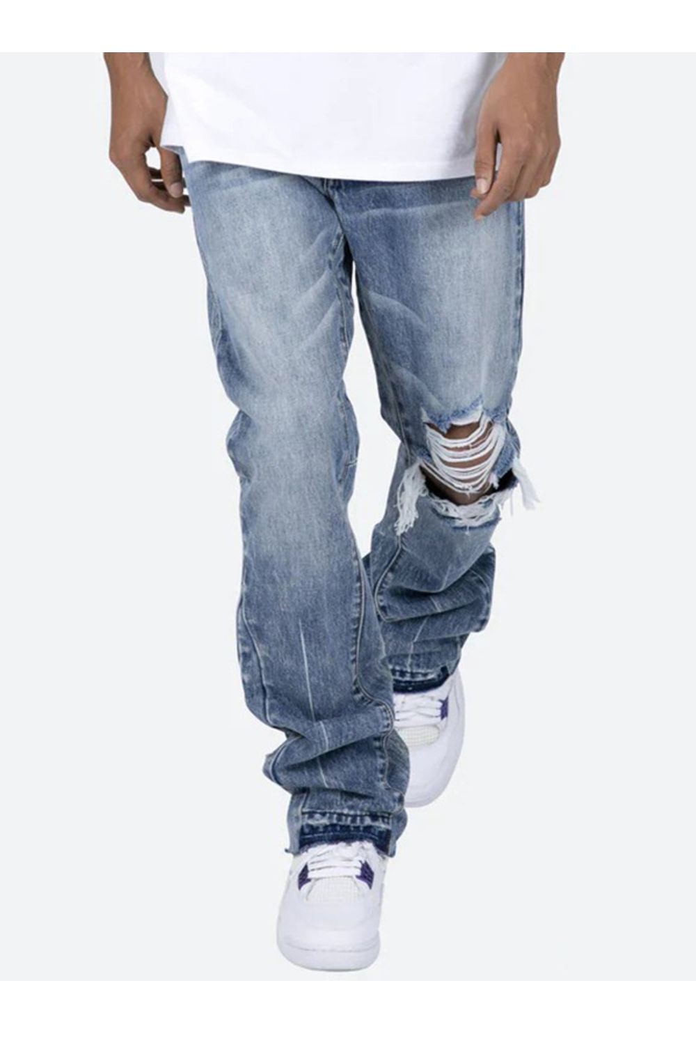 Jeans flare con design strappato