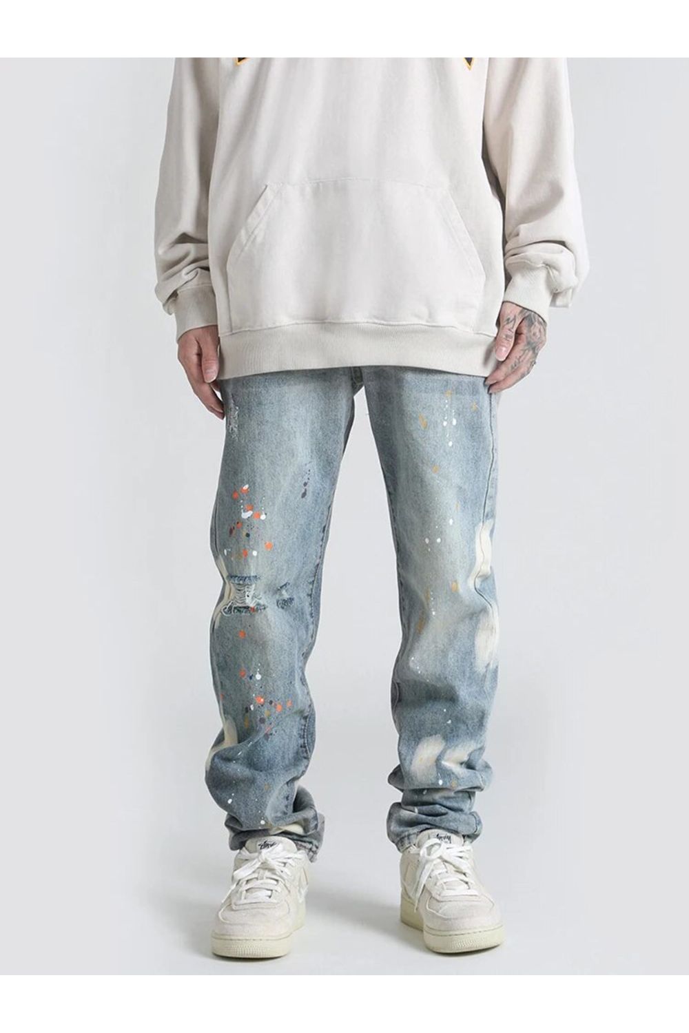Jeans con design a vernice