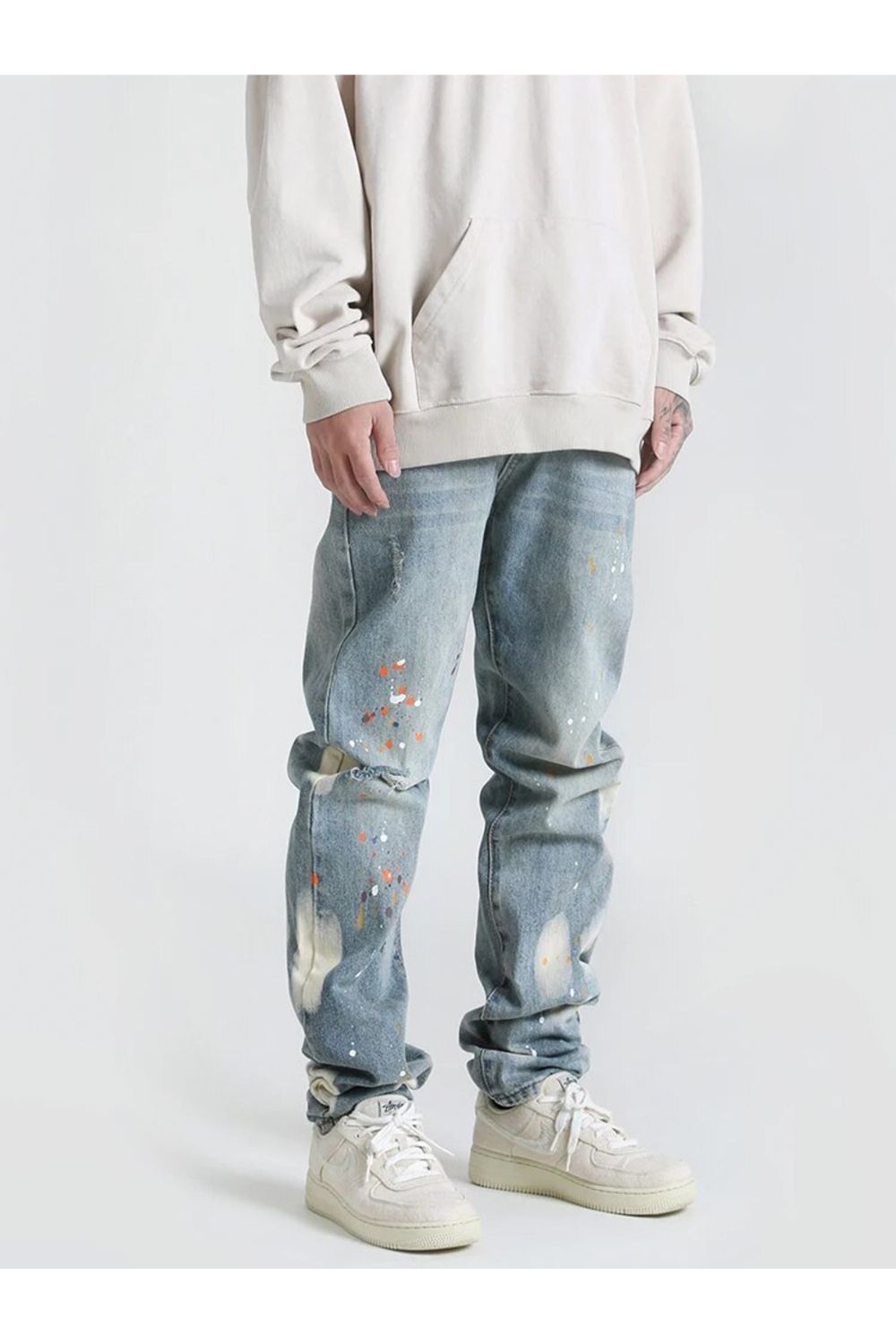 Jeans con design a vernice