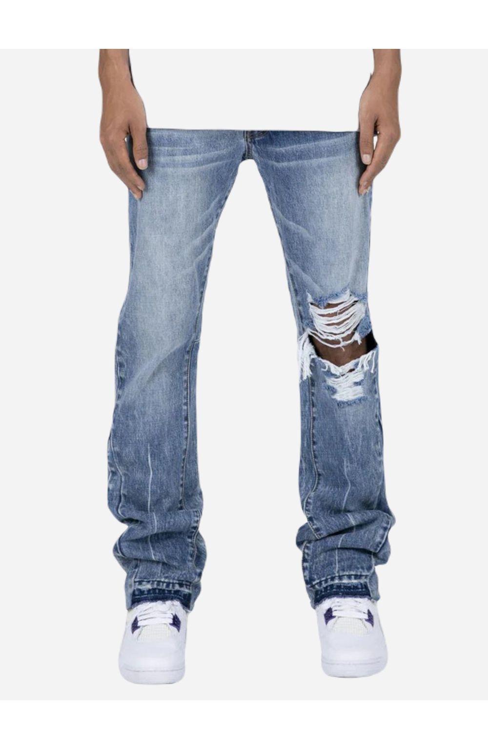 Jeans flare con design strappato