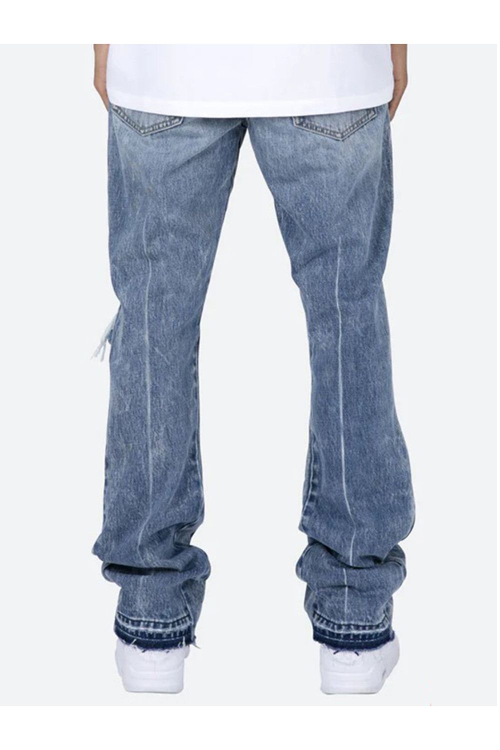Jeans flare con design strappato