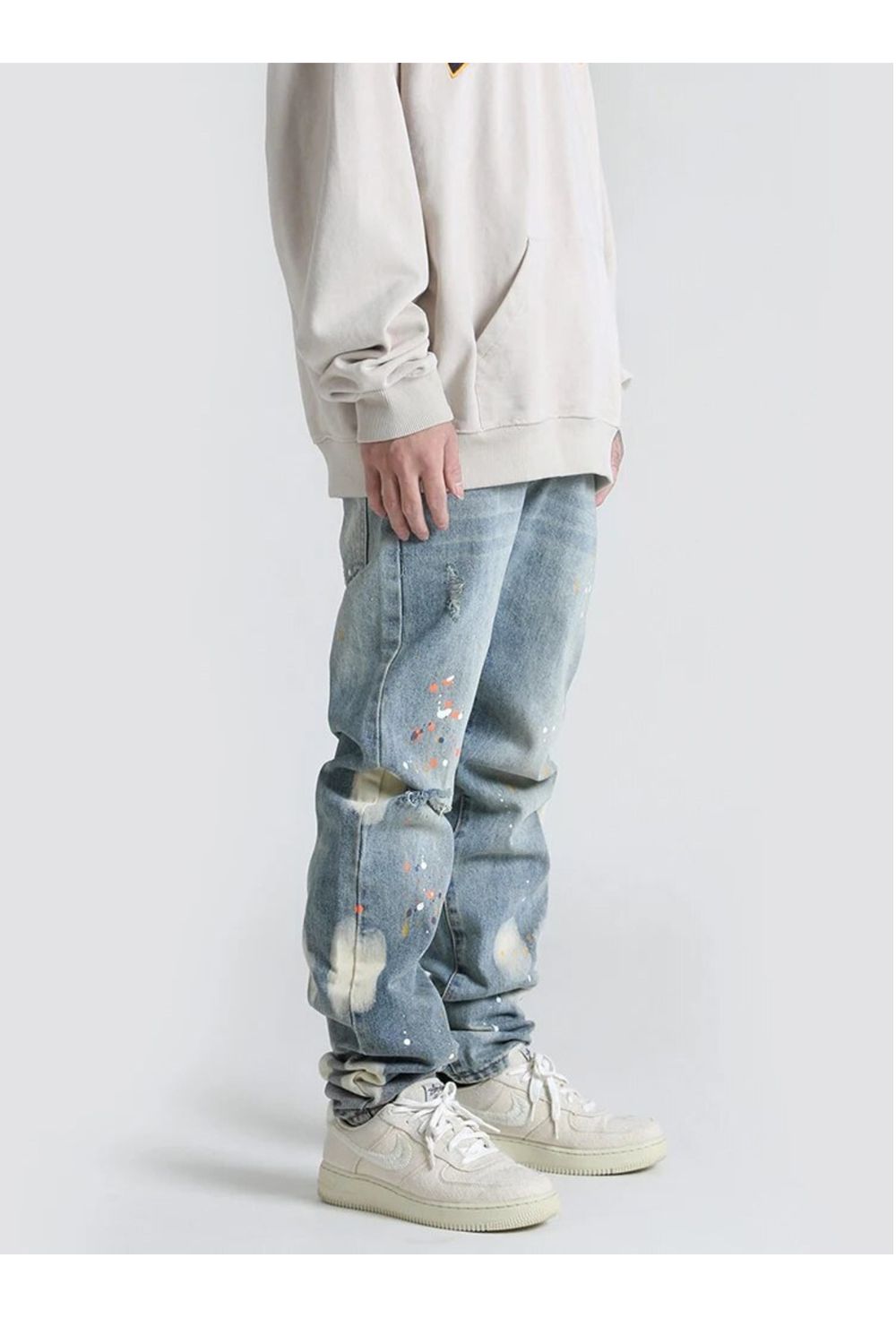 Jeans con design a vernice