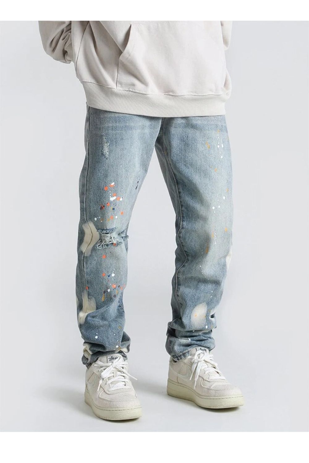 Jeans con design a vernice