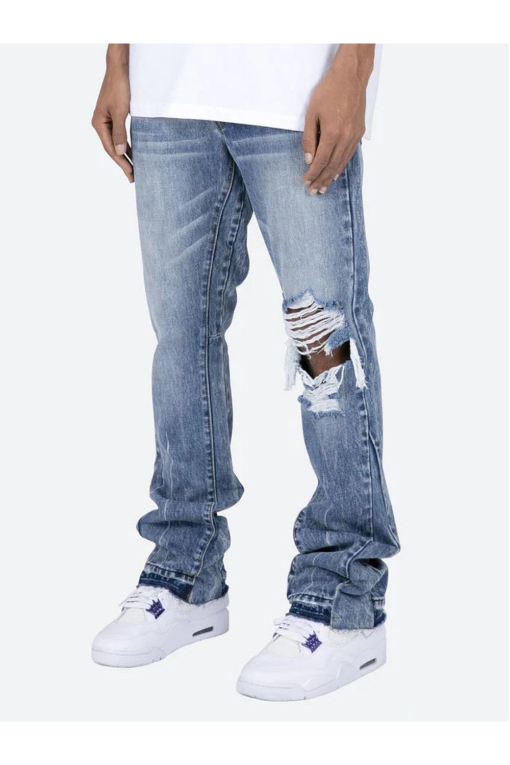 Jeans flare con design strappato